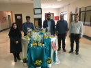 رئیس و کارکنان دانشکده مدیریت دانشگاه آزاد اسلامی واحد تهران غرب در کنار سفره هفت سین